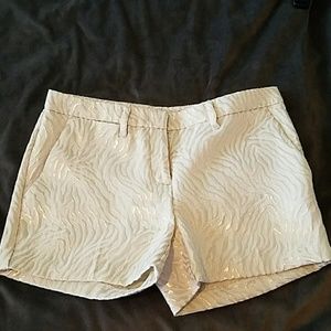 White and metallic shorts